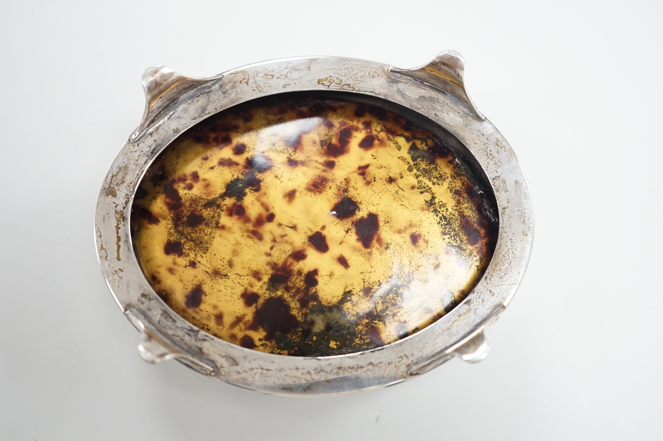 A George V engraved silver mounted oval trinket box, Joseph Gloster Ltd?, Birmingham, 1924, 10.1cm.